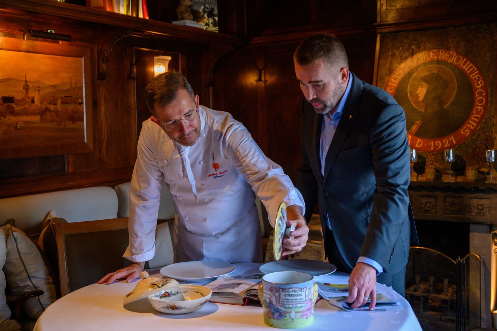 Nicolas Stamm (left) and Serge Schaal (right) still receive guests at Ettore Bugatti's table.