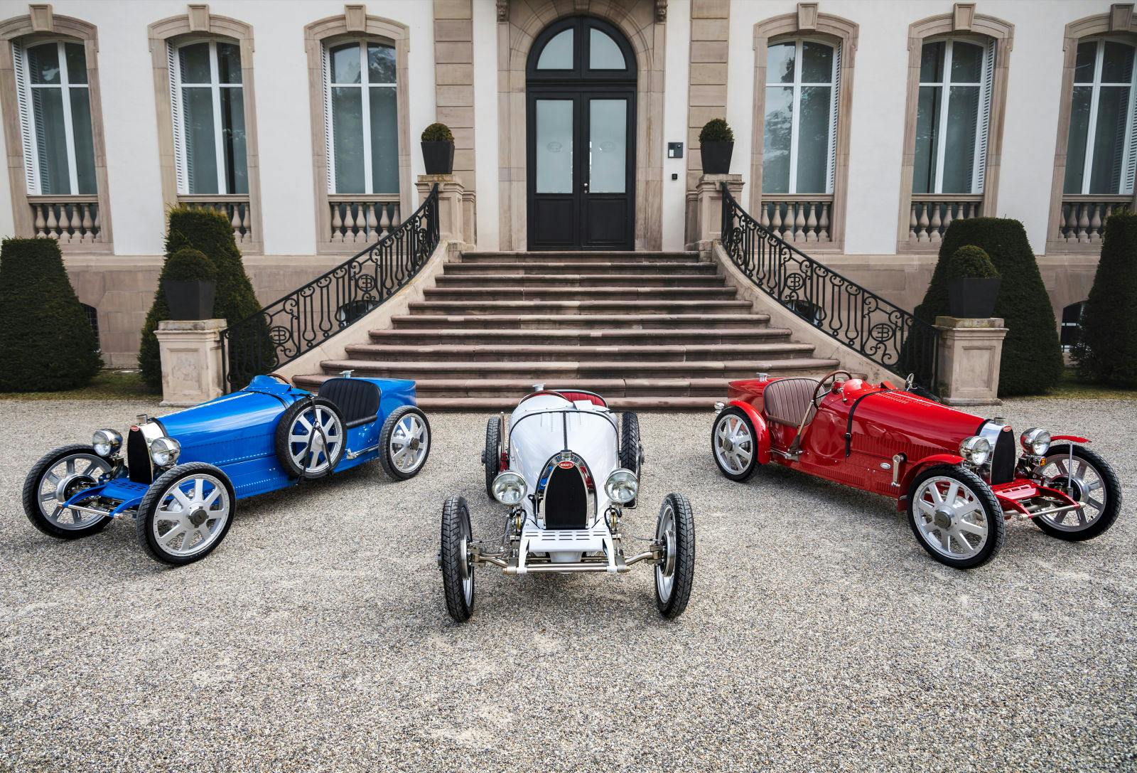 Baby Bugatti II – Honoring Bugatti’s French origins in front of the Château Saint-Jean in Molsheim