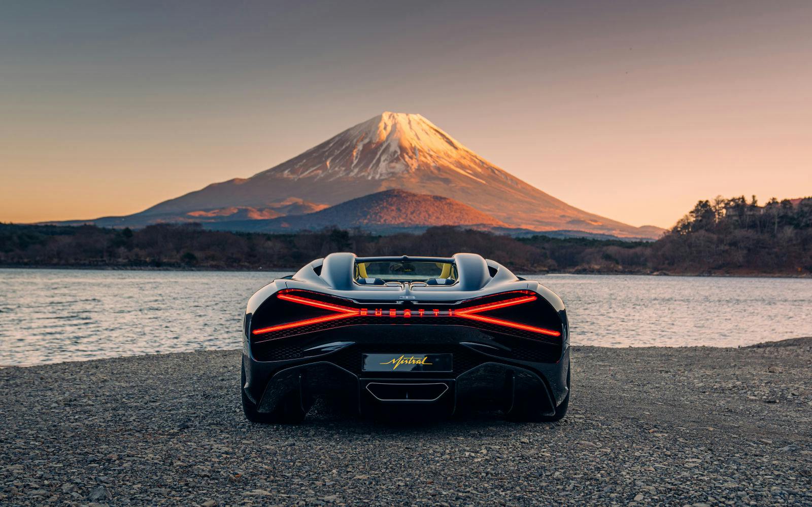 The X-shaped rear light of the W16 Mistral in front of the legendary Mount Fuji.
