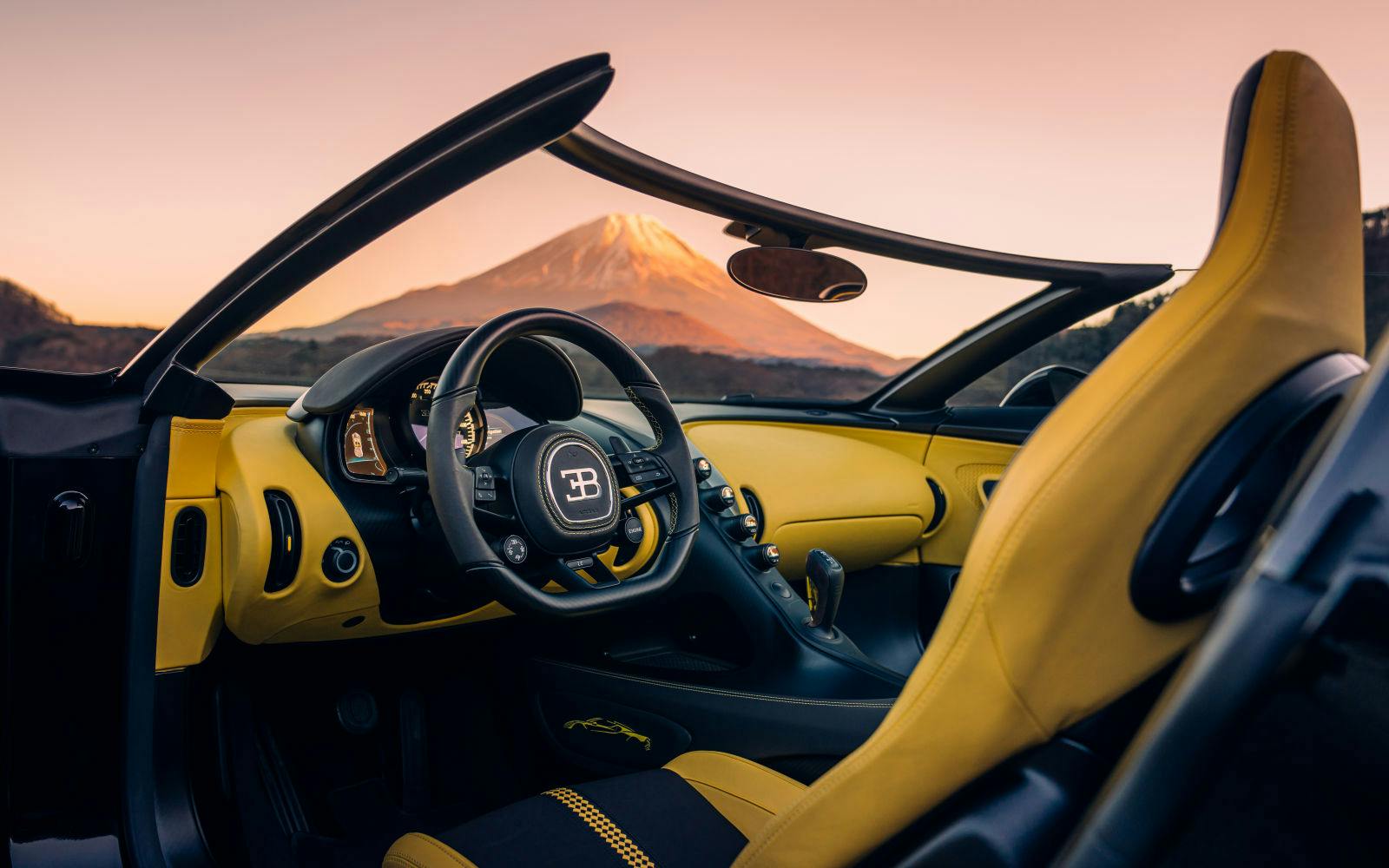 The black and yellow interior of the W16 Mistral is in homage to Ettore Bugatti‘s favourite colors.
