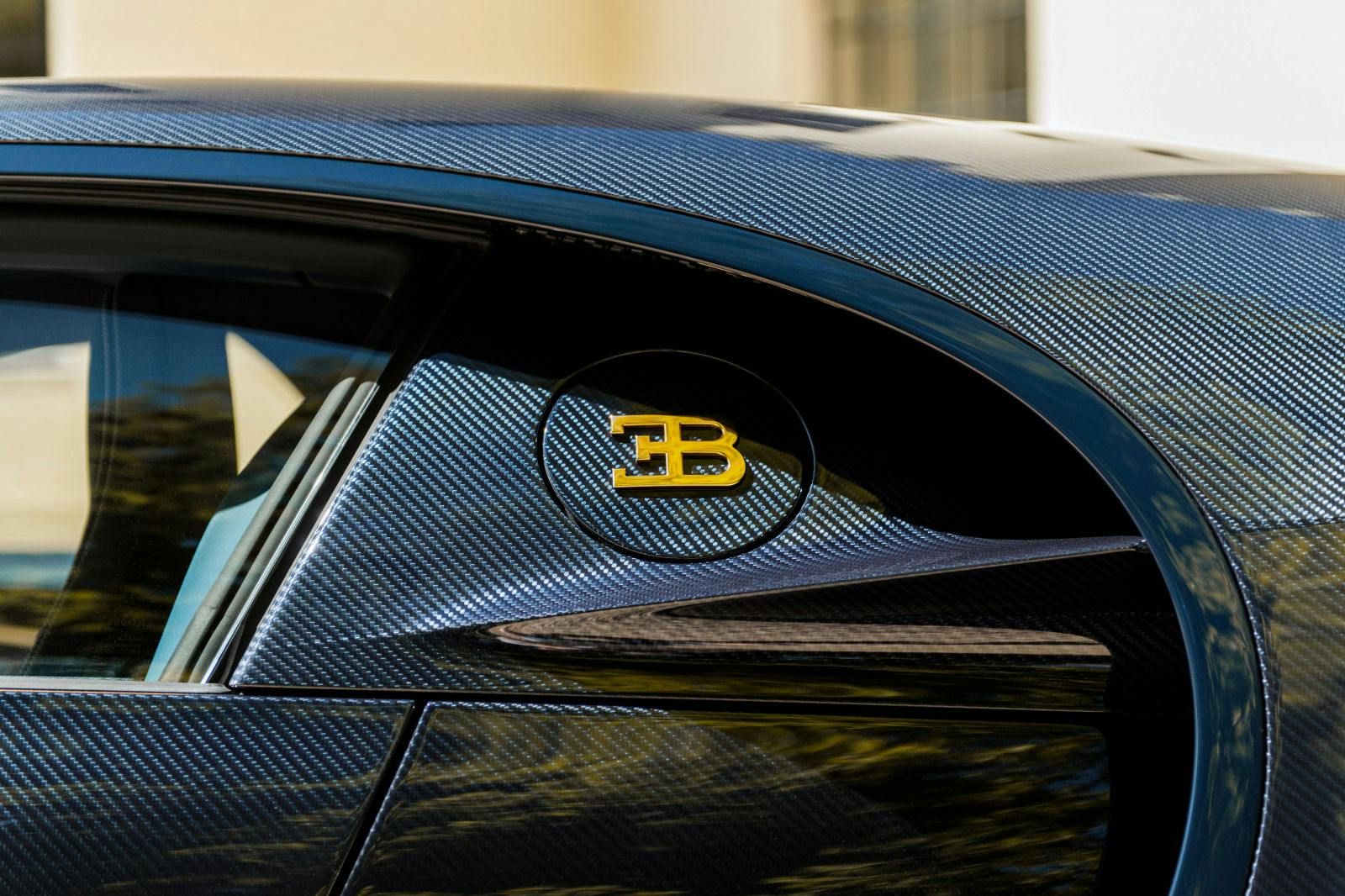 The “EB” emblem displayed on the Chiron L’Ébé has a 24-karat gold finish.