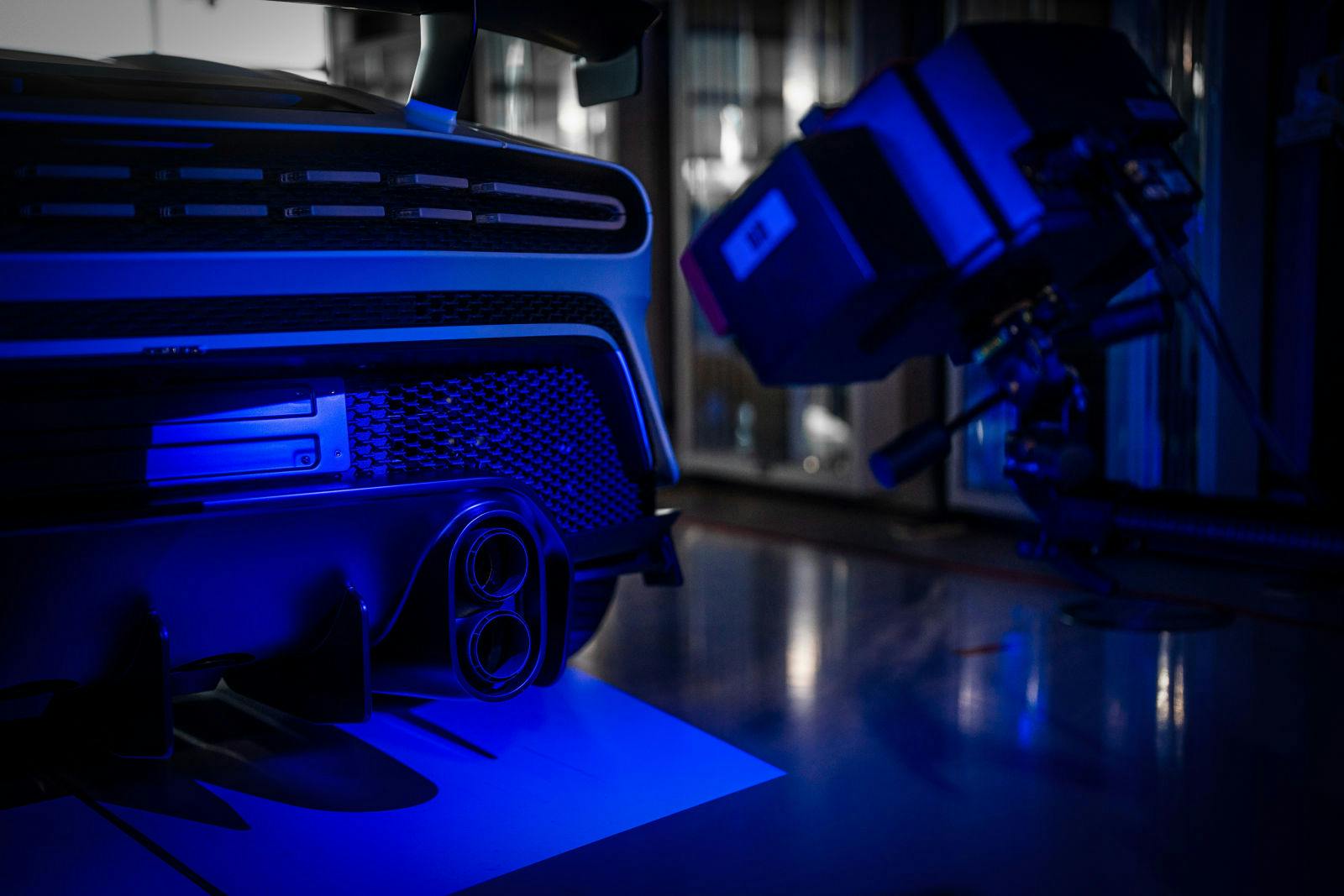 The 3D scanner analyzes the 3D printed titanium trim covers of the Bugatti Centodieci.