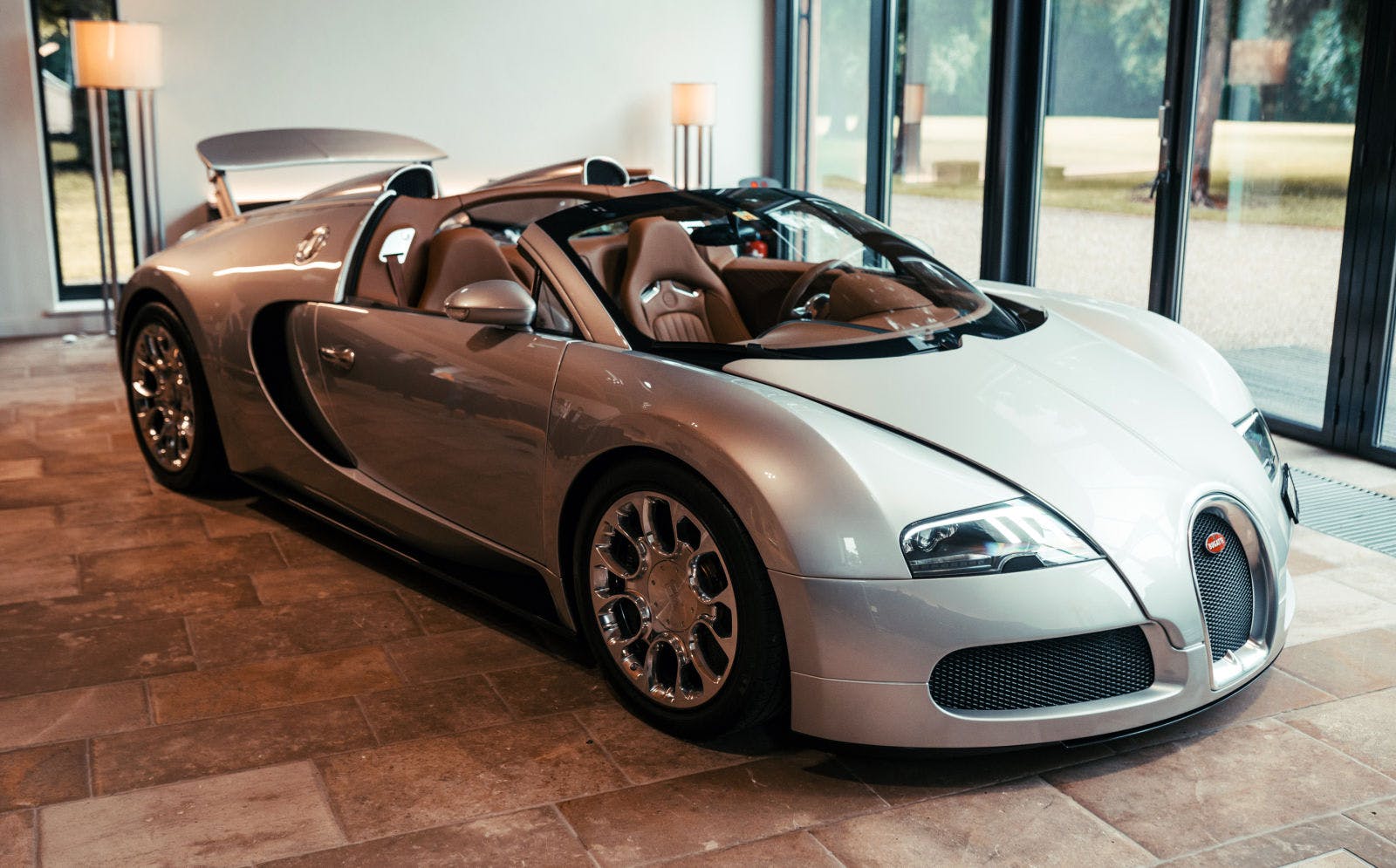 The Veyron 16.4 Grand Sport 2.1 in its original condition: White Silver Metallic paintwork and Cognac leather interior trim.