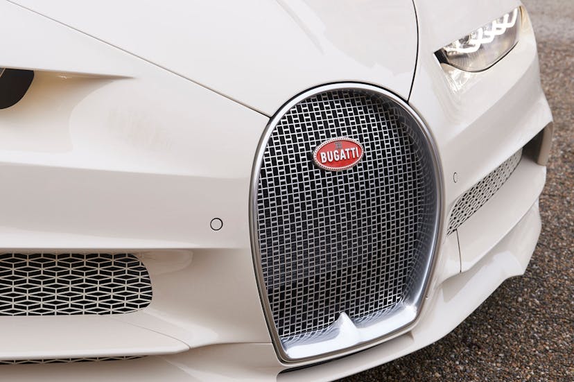 The horseshoe-shaped grille of the “Chiron habillé par Hermès” features the famous H" monogram of the brand.	"