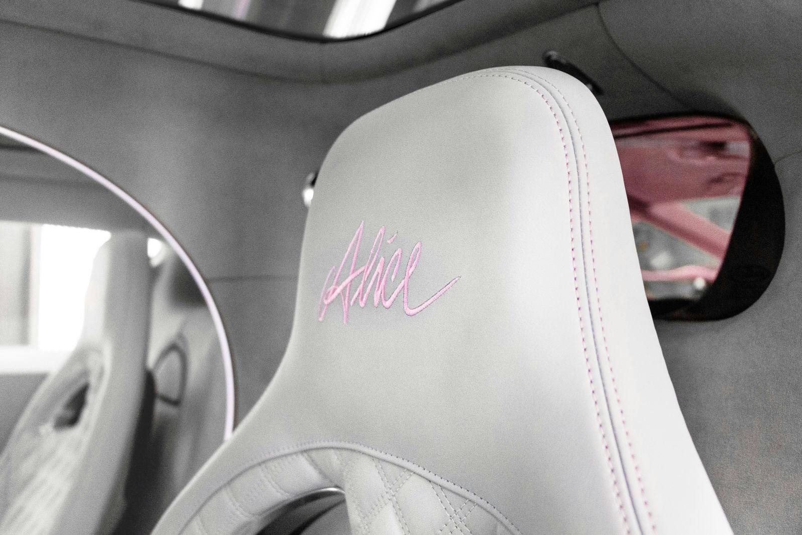 Alice" logo stitching in the headrest of the hyper sports car."