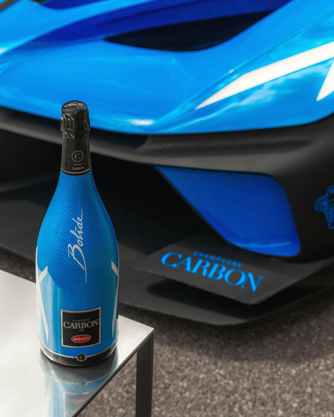 La cuvée Bugatti ƎB.03 par Champagne Carbon et la Bugatti Bolide : un accord parfait. Please enjoy responsibly. Don't drink and drive.