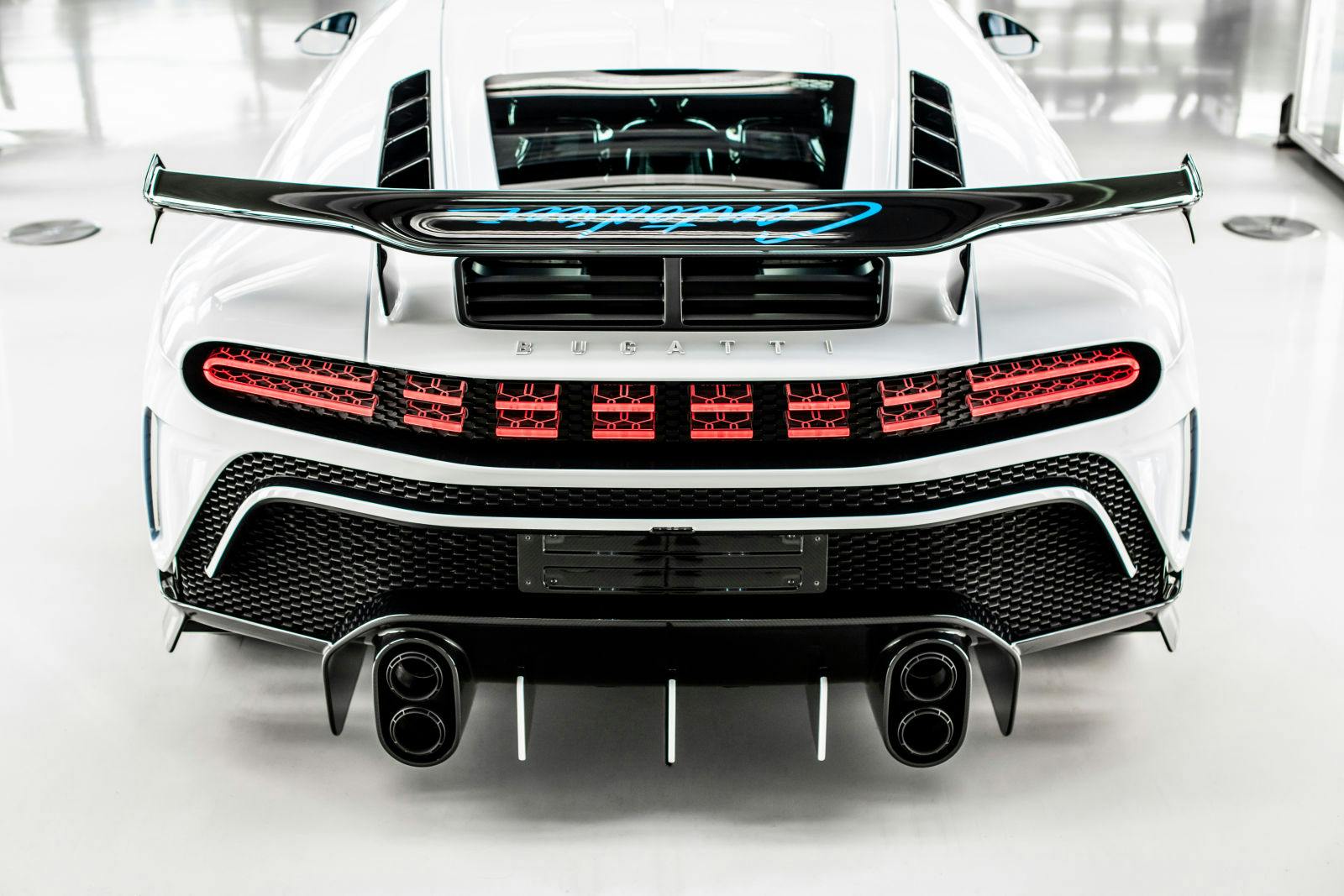 The rear wing of the Centodieci is reminiscent of that of the EB110.